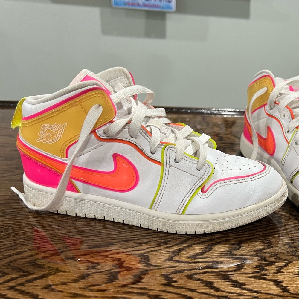 Nike Air Jordan pink and yellow